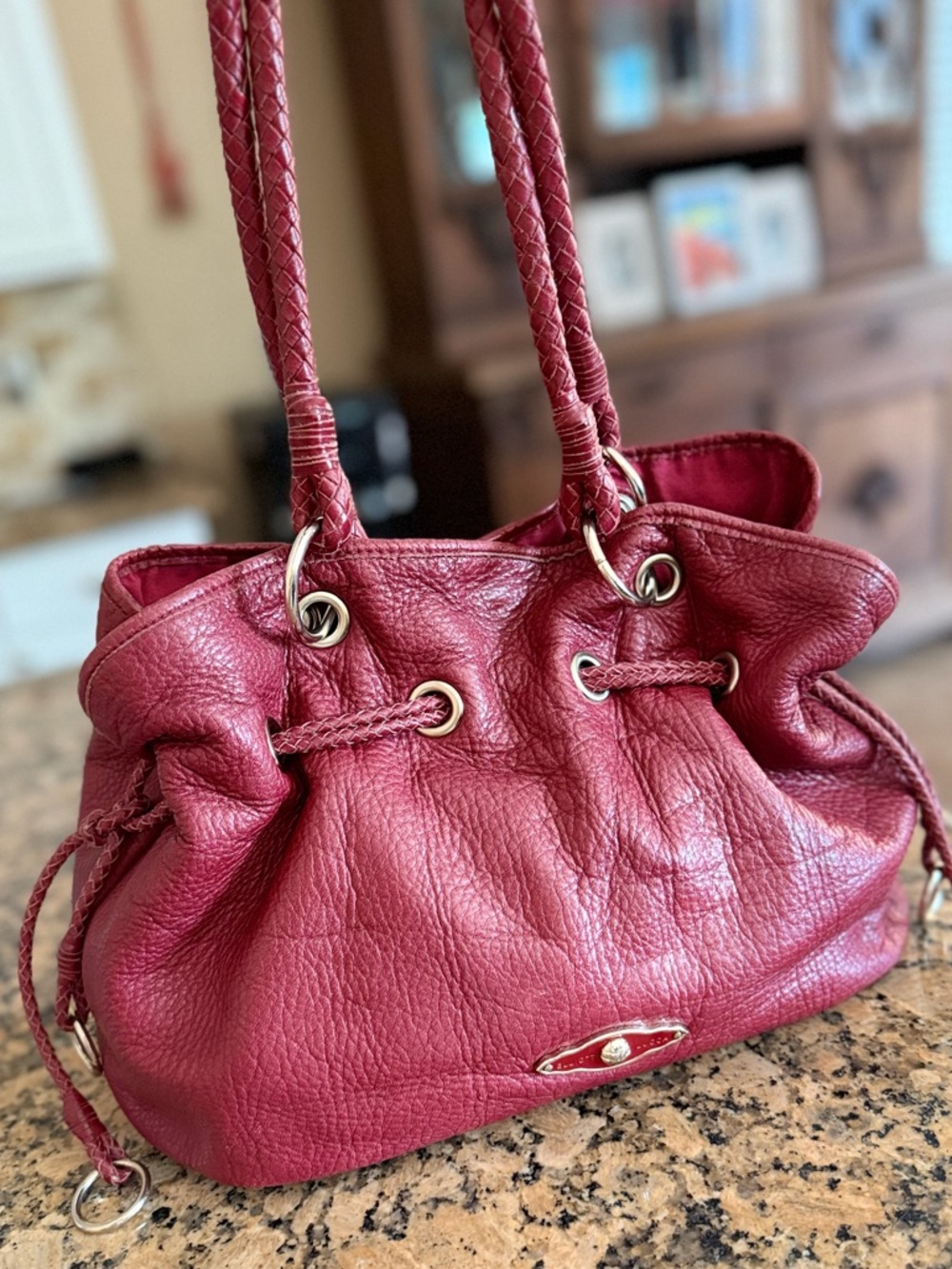 Elliott Lucca leather drawstring large sized bucket shoulder bag in red